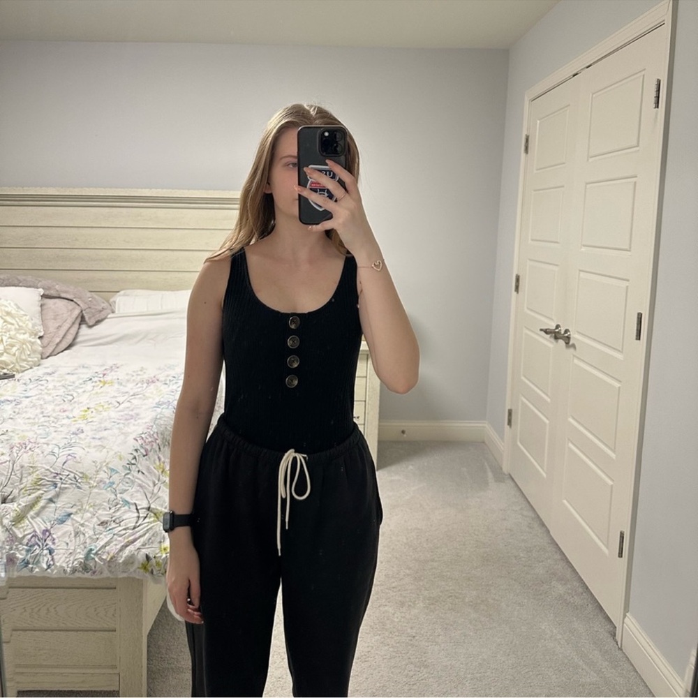 Heart & Hips black ripped sleeveless bodysuit with button detailing size M